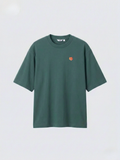 dark_green_oversized_boxy_tee_with_1.5_inch_embroidered_tiger_face_icon_logo_by_studio_tigre_on_a_premium_uniqlo_airism_tee on a white background